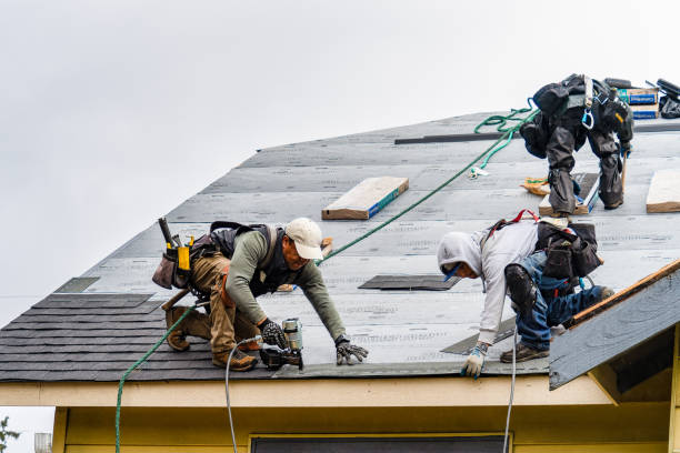 Professional Emergency Roof Repair technician working in Fishers Island, NY